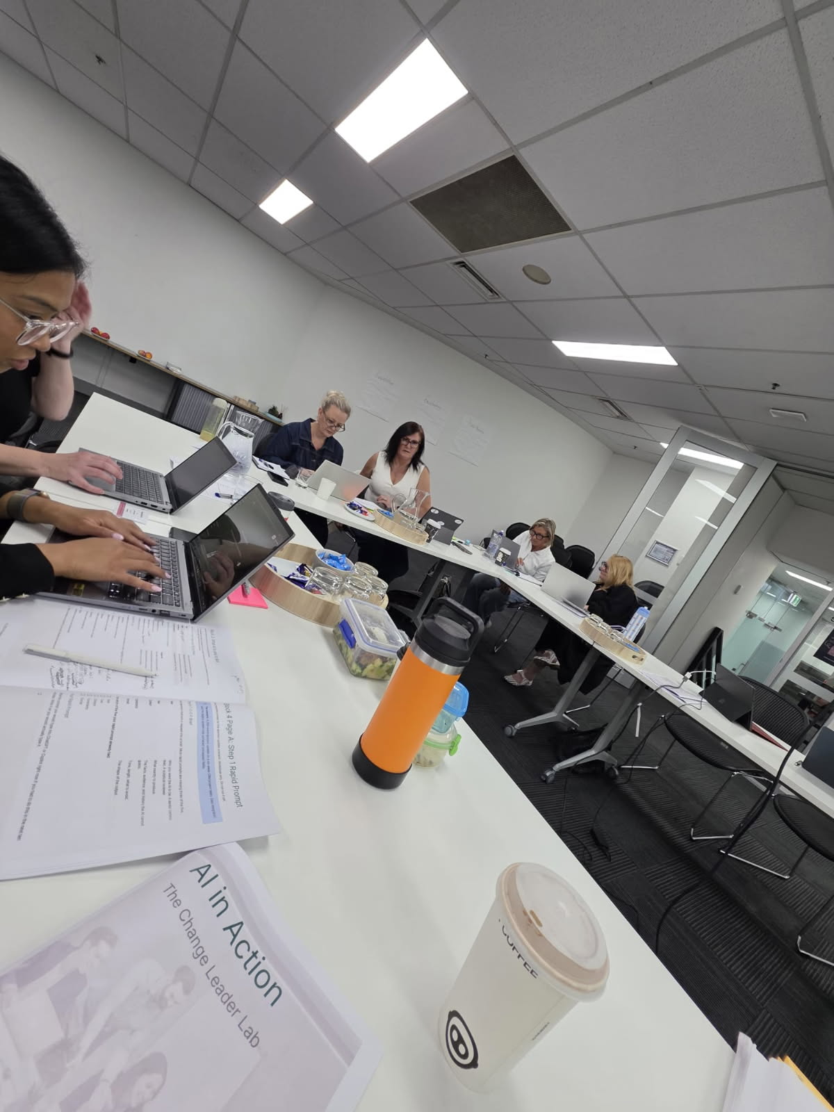 Workshop participants in the Private AI Lab room